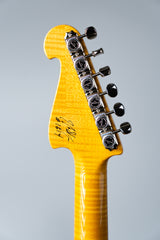 Close-up of the back of a Knaggs Severn electric guitar headstock with Gotoh tuning pegs on a gray background