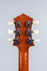 Knaggs Kenai electric guitar back of the headstock with Kluson tuning pegs on a gray background