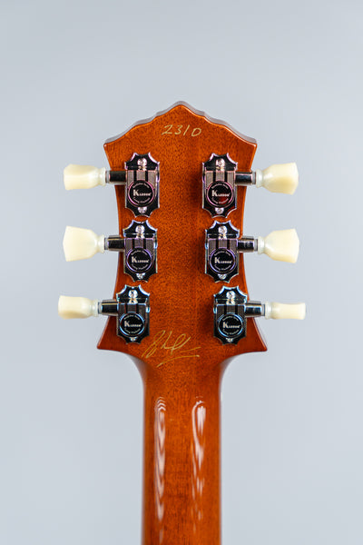 Knaggs Kenai electric guitar back of the headstock with Kluson tuning pegs on a gray background